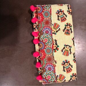 Colorful Patterned Clutch with Pom Poms